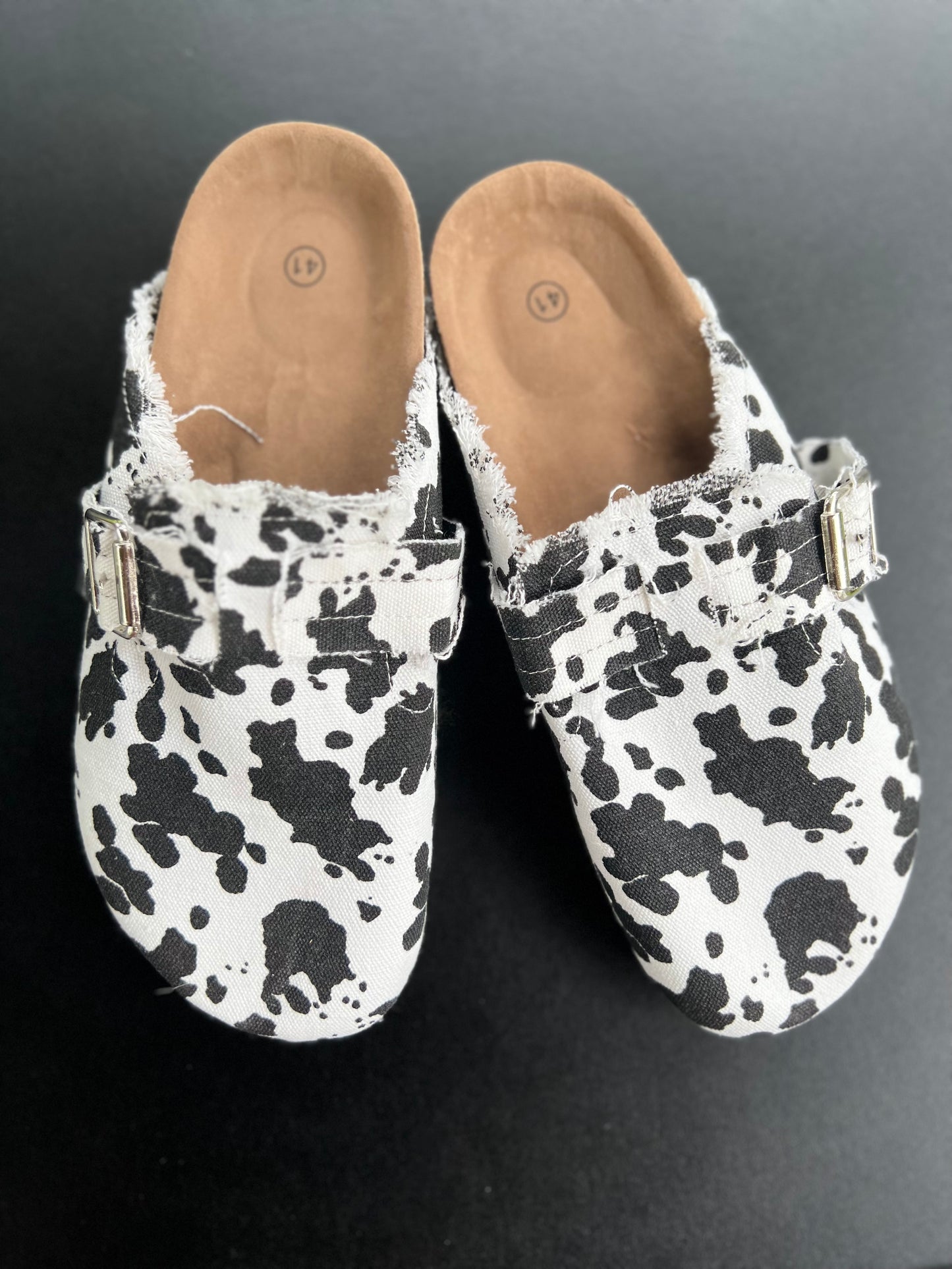 Cow Print Slip Ons