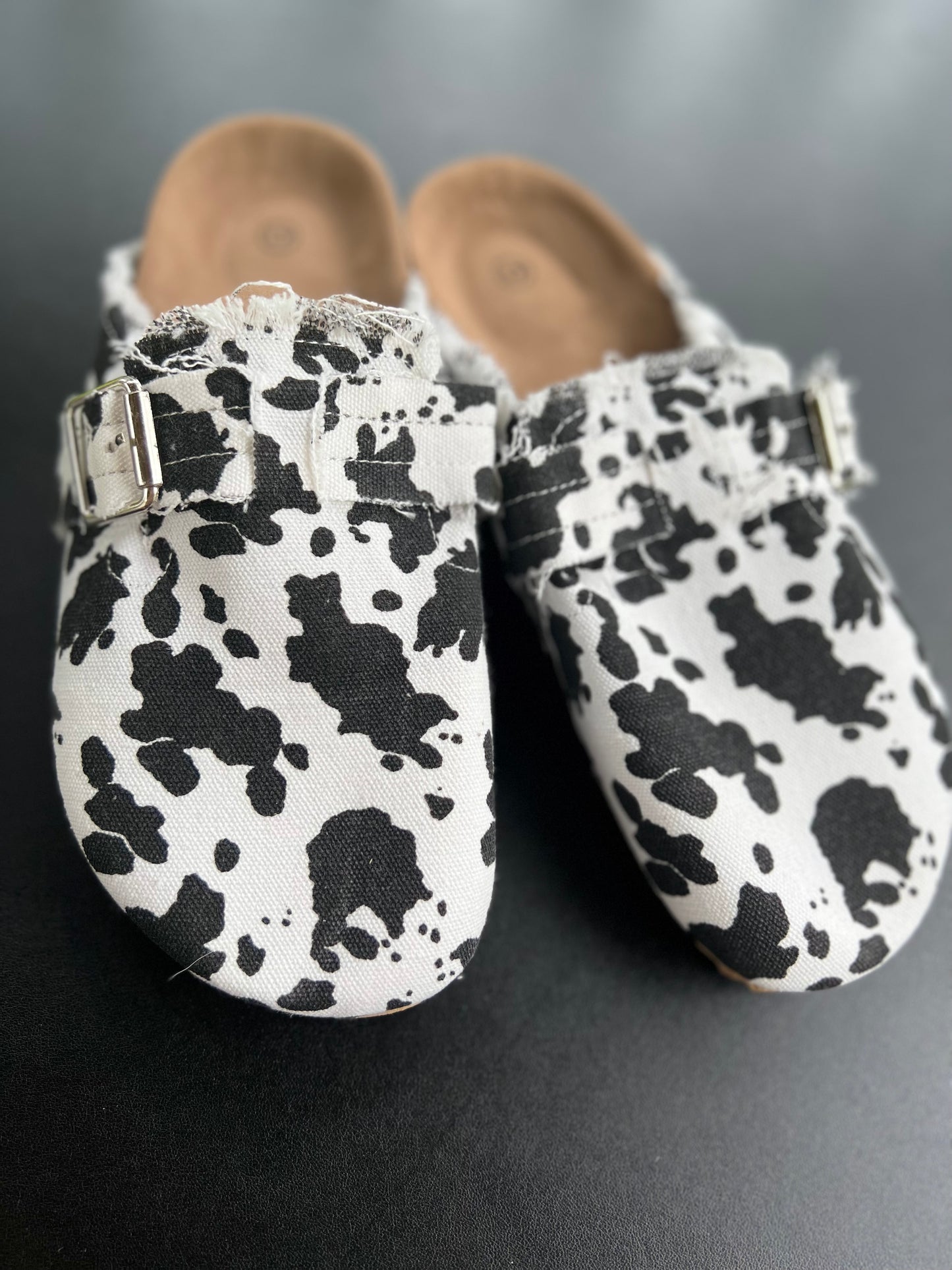 Cow Print Slip Ons